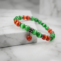 Emerald green and ember beaded cats eye bracelet
